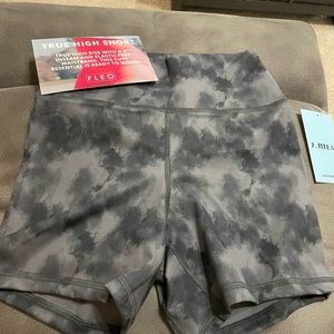 Fleo True High Rise with a 4” inseam. Brand new, never worn.